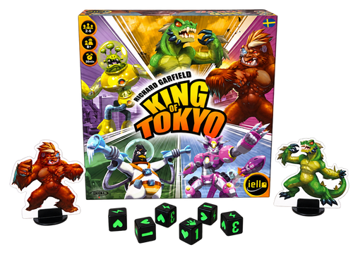 King of Tokyo svensk utgåva: asken med två monsterfigurer och sex tärningar, frilagda utan bakgrund.