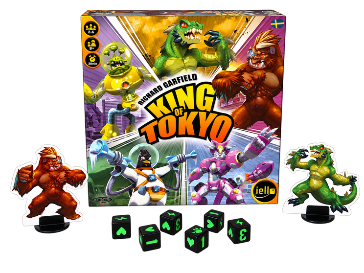 King of Tokyo svensk utgåva: asken med två monsterfigurer och sex tärningar, frilagda utan bakgrund.